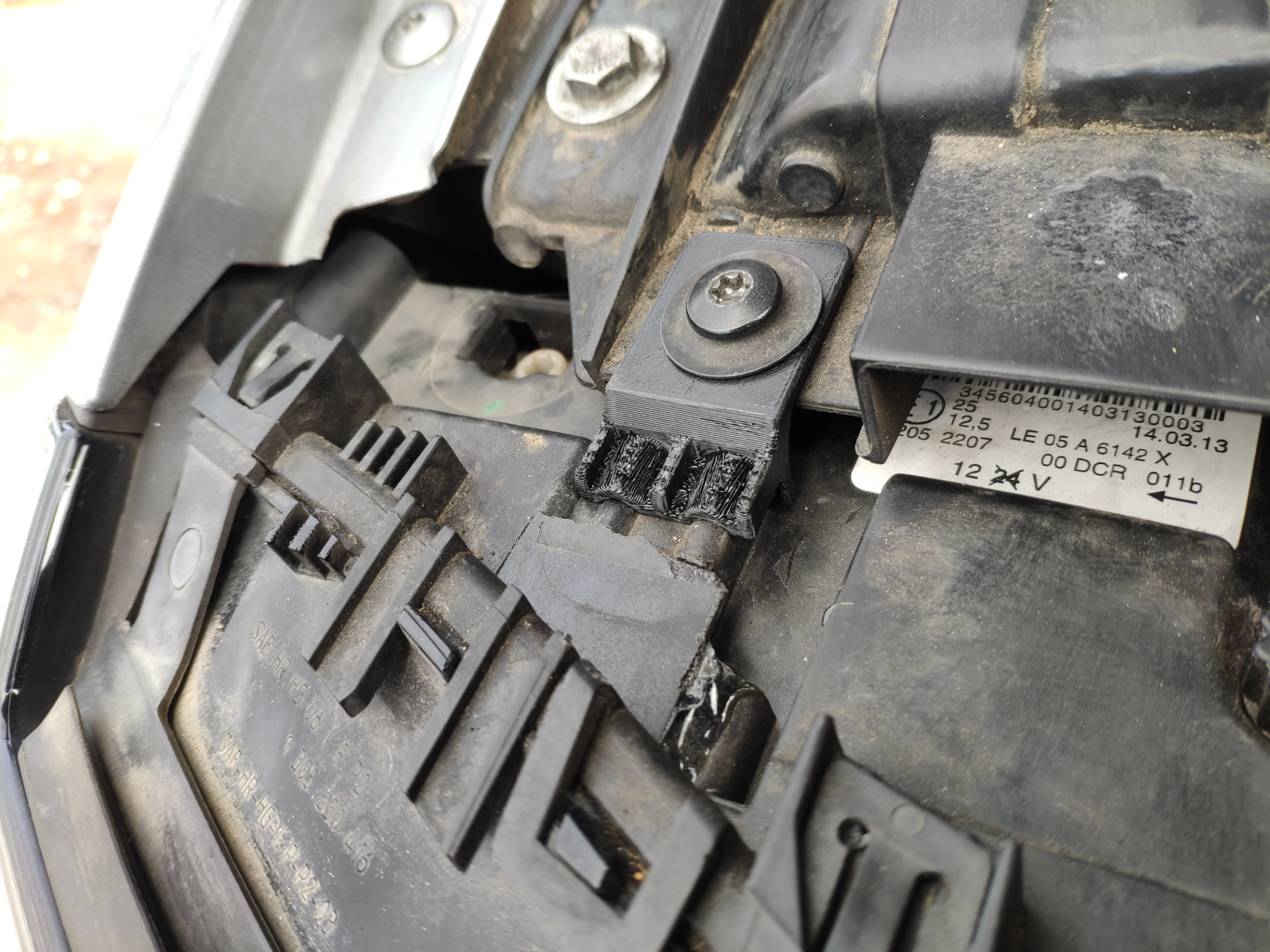 BMW E83 Headlight Repair