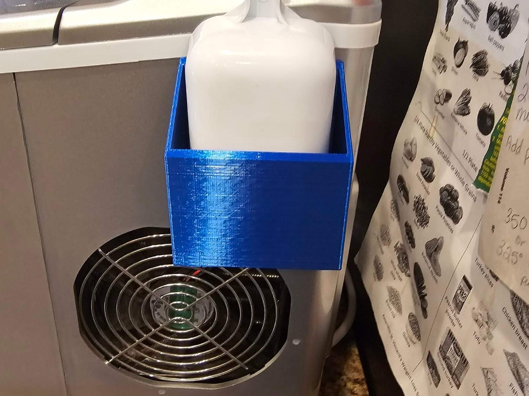 Ice scoop holder for countertop icemaker