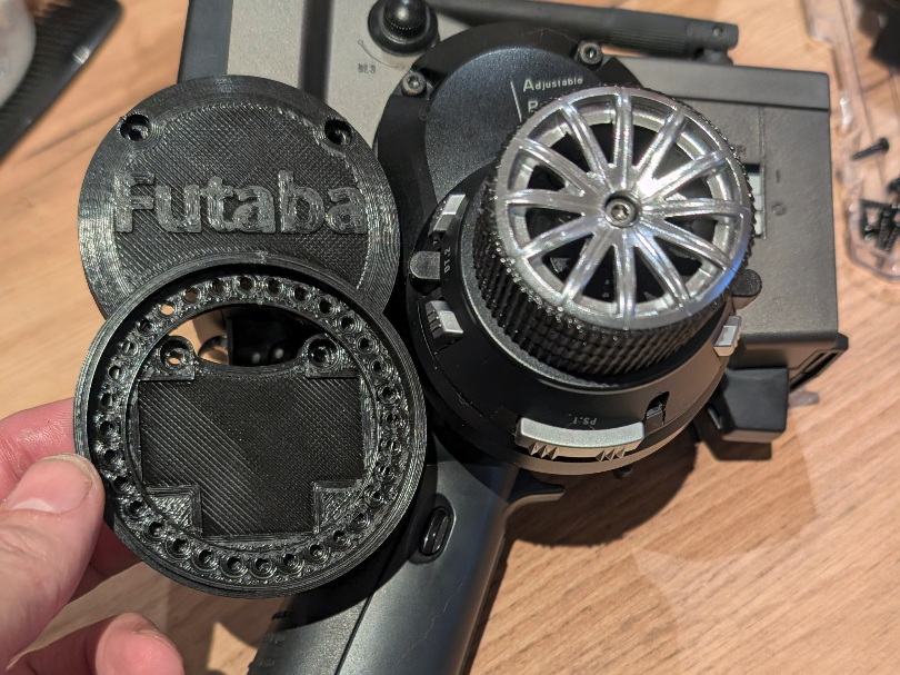 Futaba 3PK Adjustable steering wheel adapter.