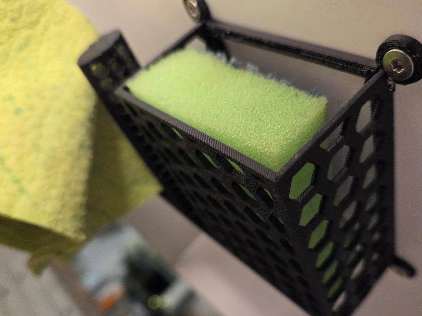 Drying rack under cabinet for sponge and dishcloth