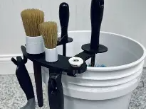 brush holder for bucket