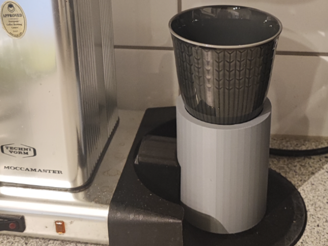 Cup lifter for coffee brewer