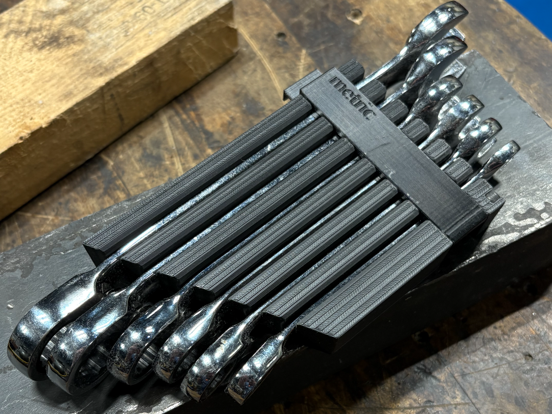 Metric wrench holder.