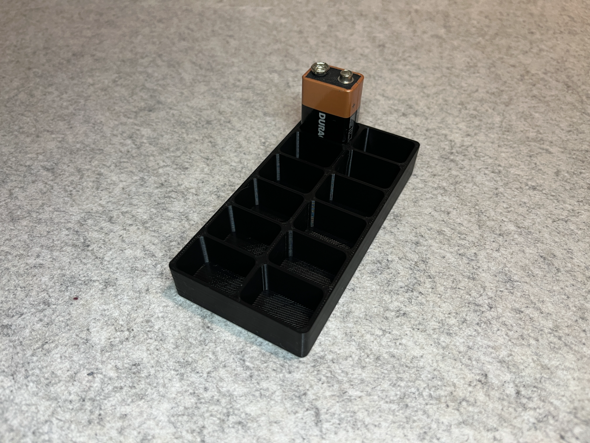 Battery stand for 12 9V batteries