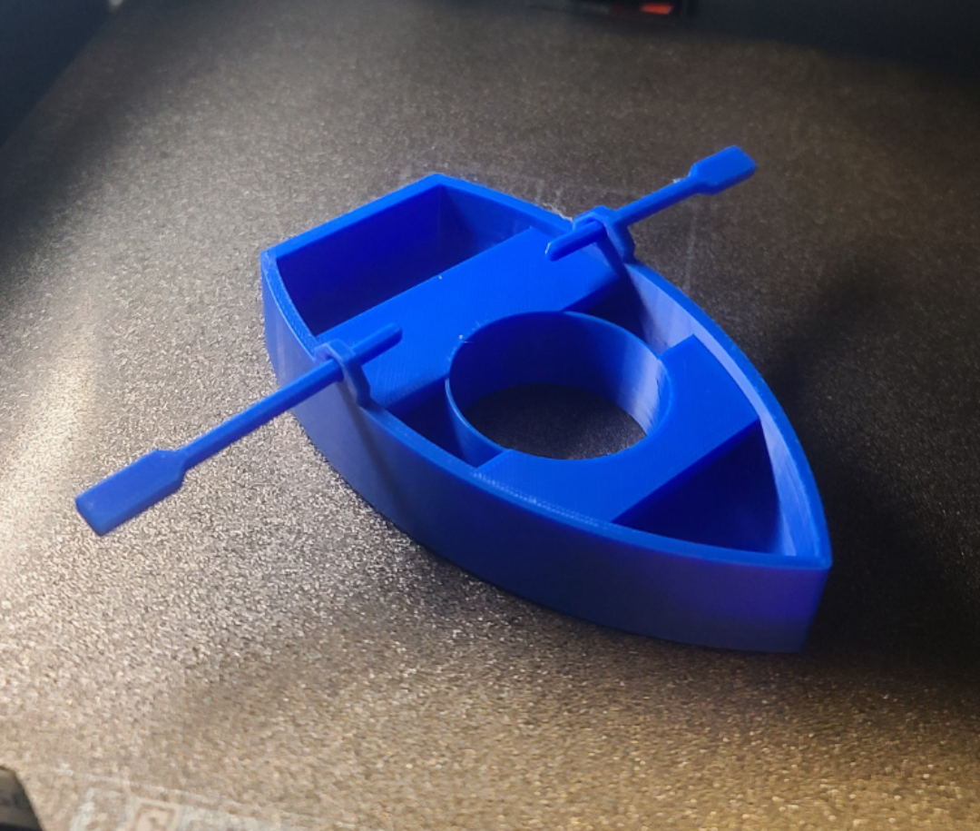 Miniature Row Boat fish feeder