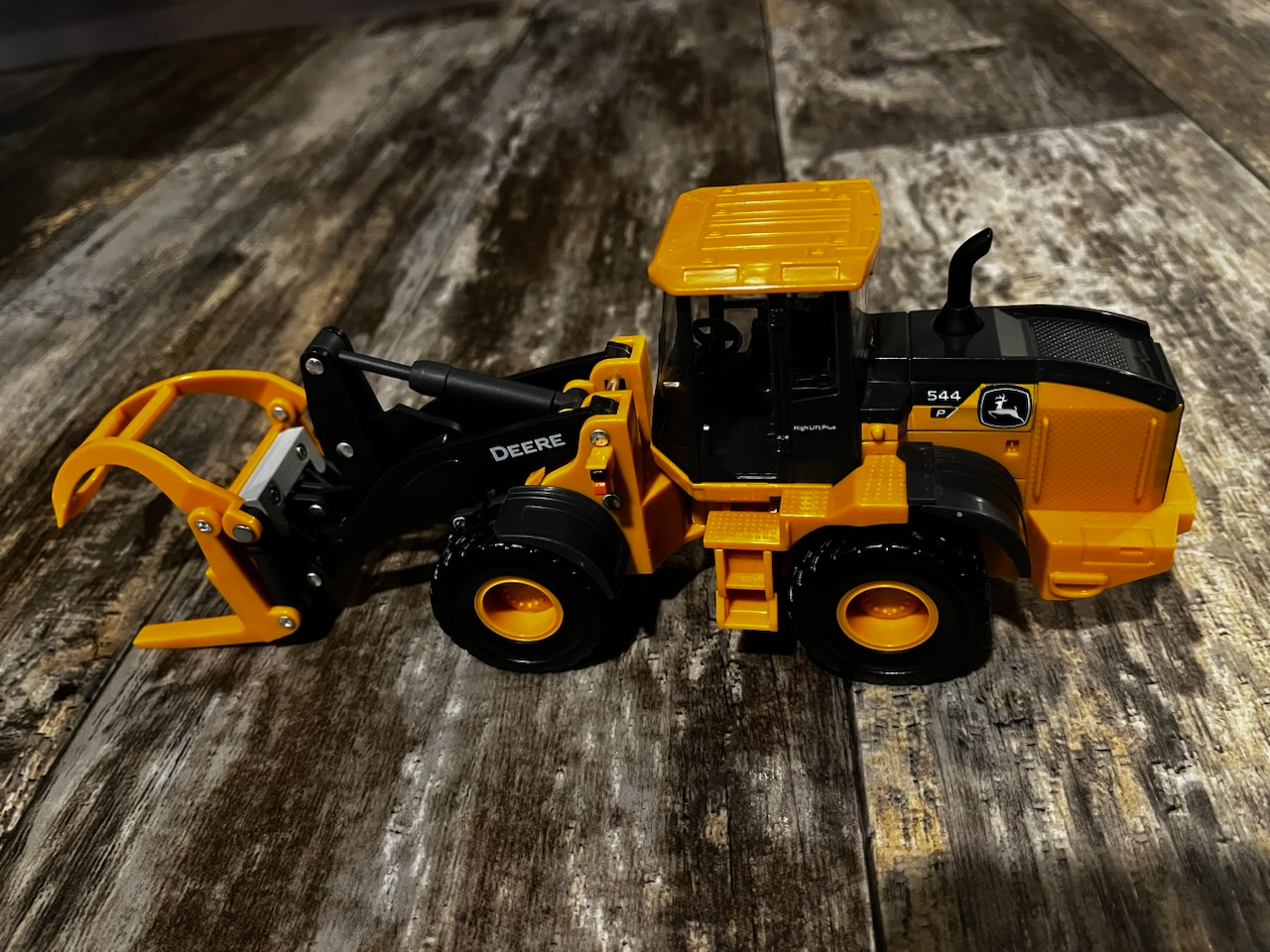JD payloader attachment bracket