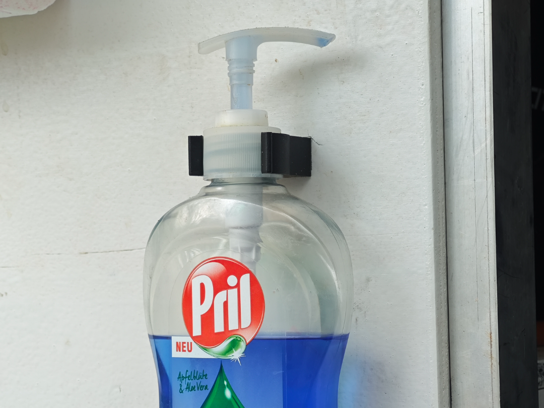 Washing liquid bottle wall/cabinet mount