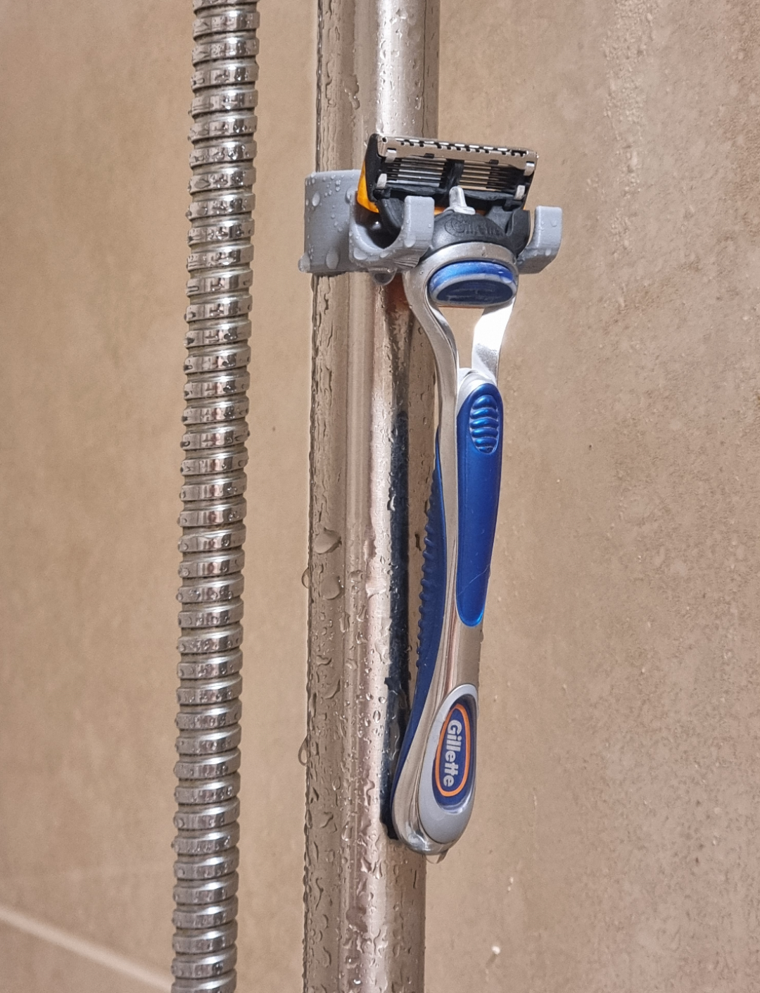 Razor holder for shower rail