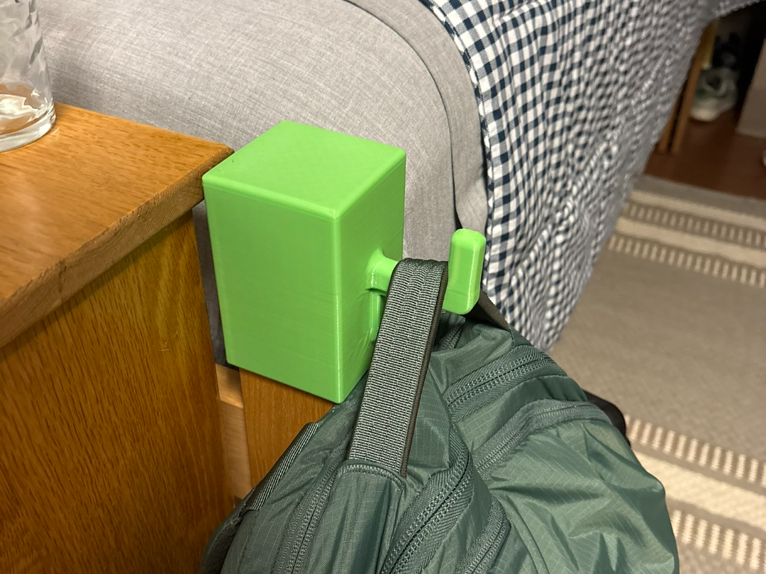 Backpack hanger for college dorm
