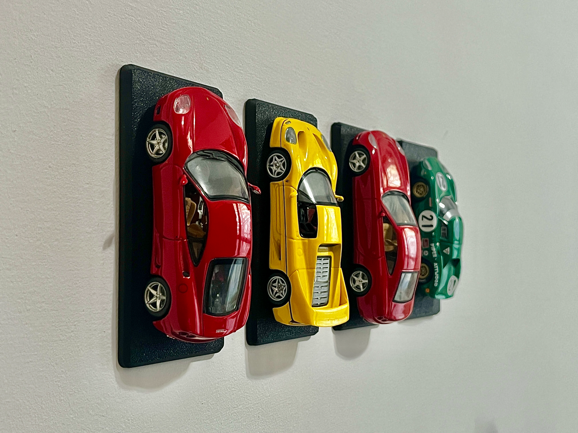 Wall stand for 1:43-scale car w/ double-sided tape