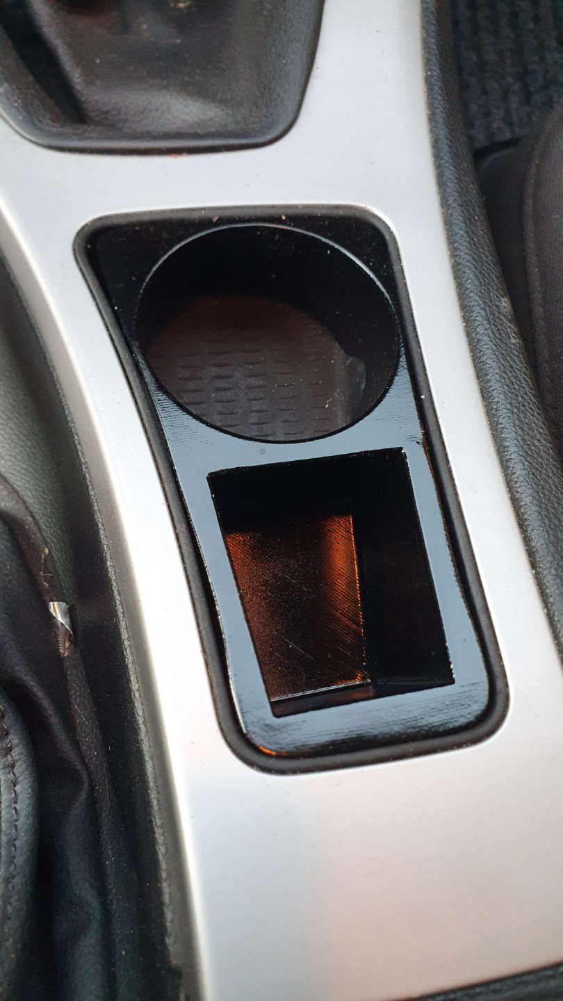 Cup holder for BMW e90
