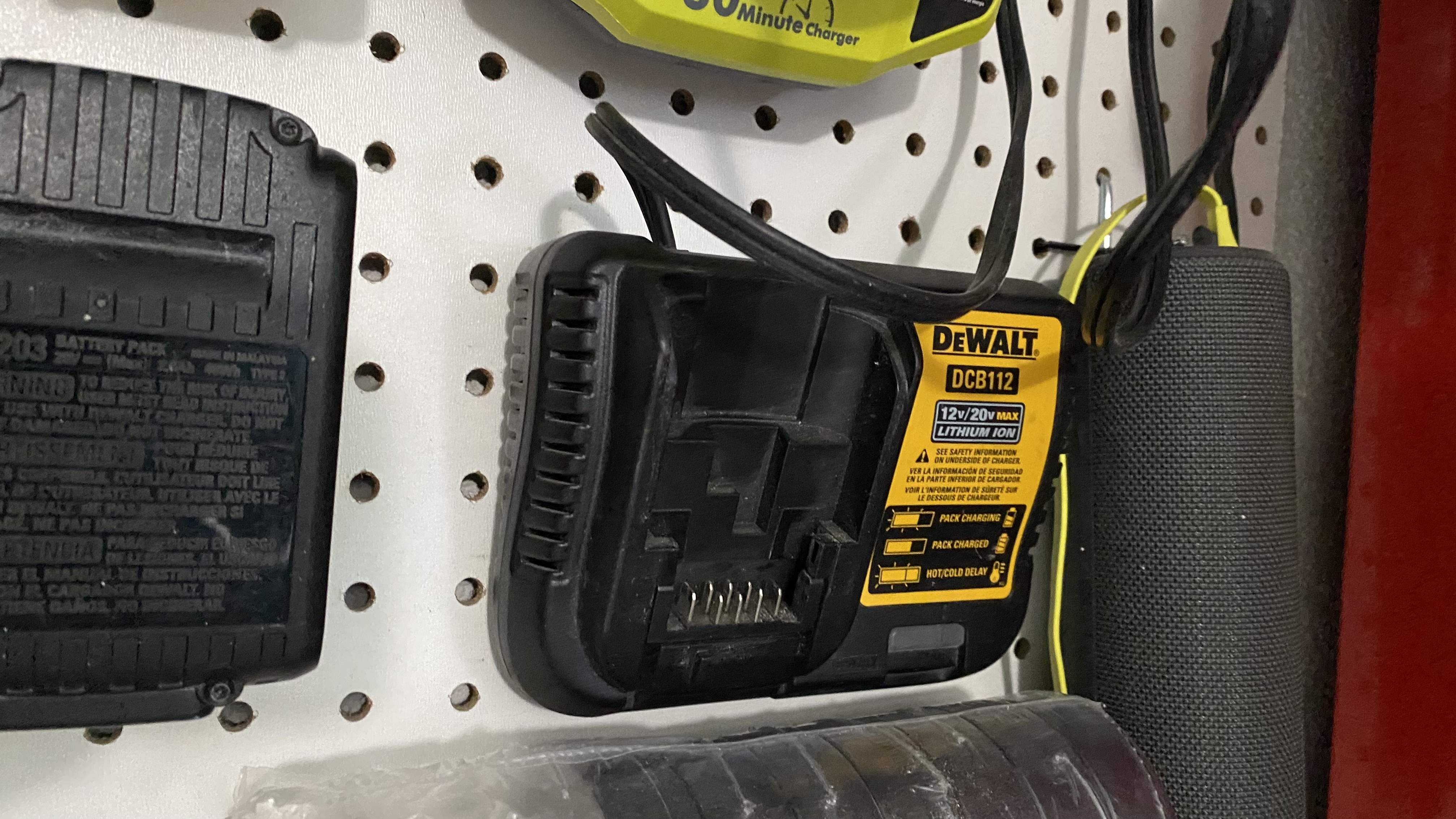 Sy's Peglock-Dewalt Charger DCB112/107 Pegboard