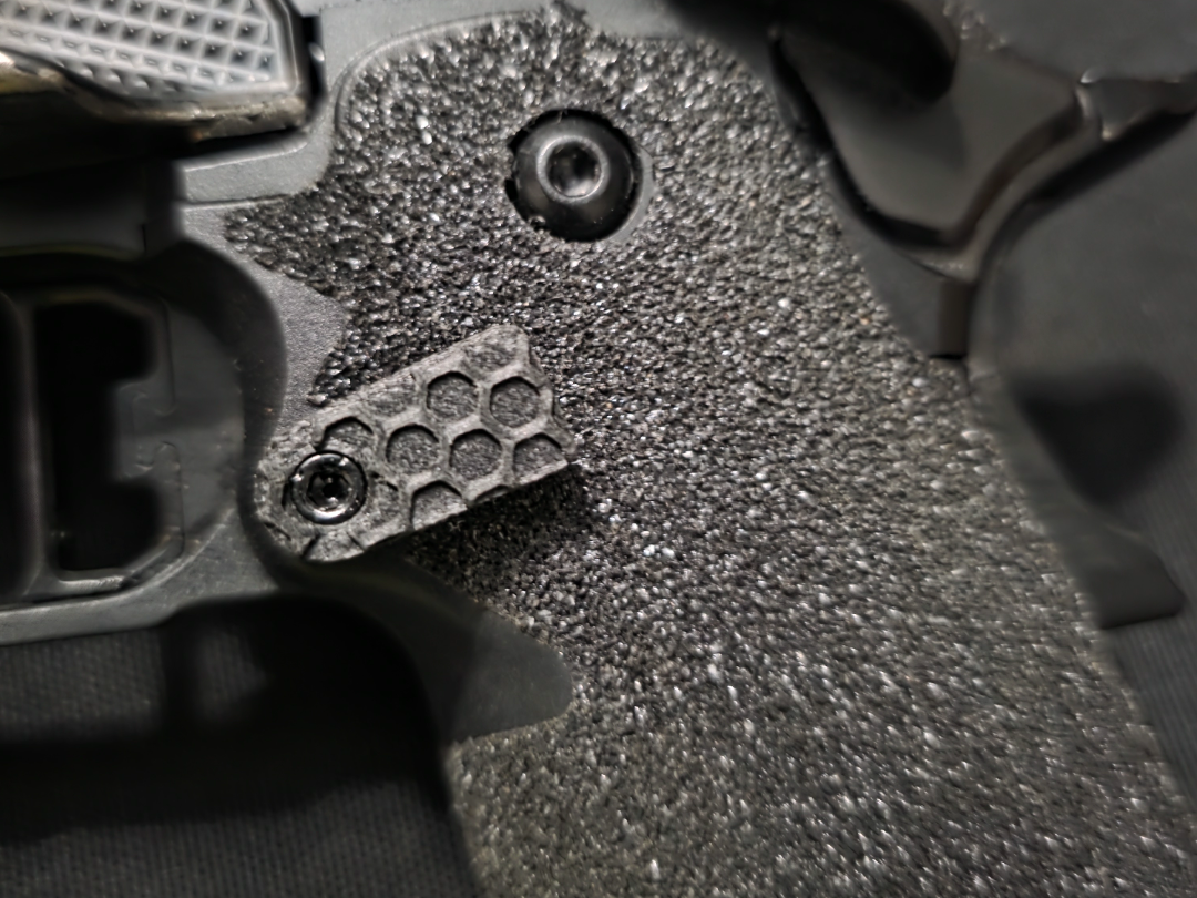 2011-DS1911 extended mag release button