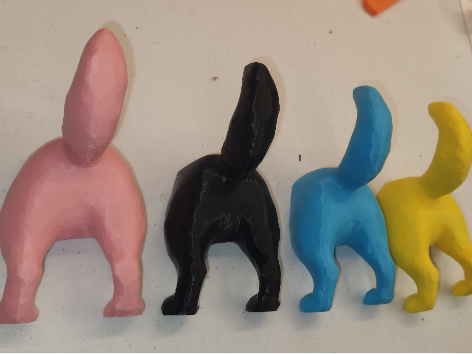 Dog tail wall hook