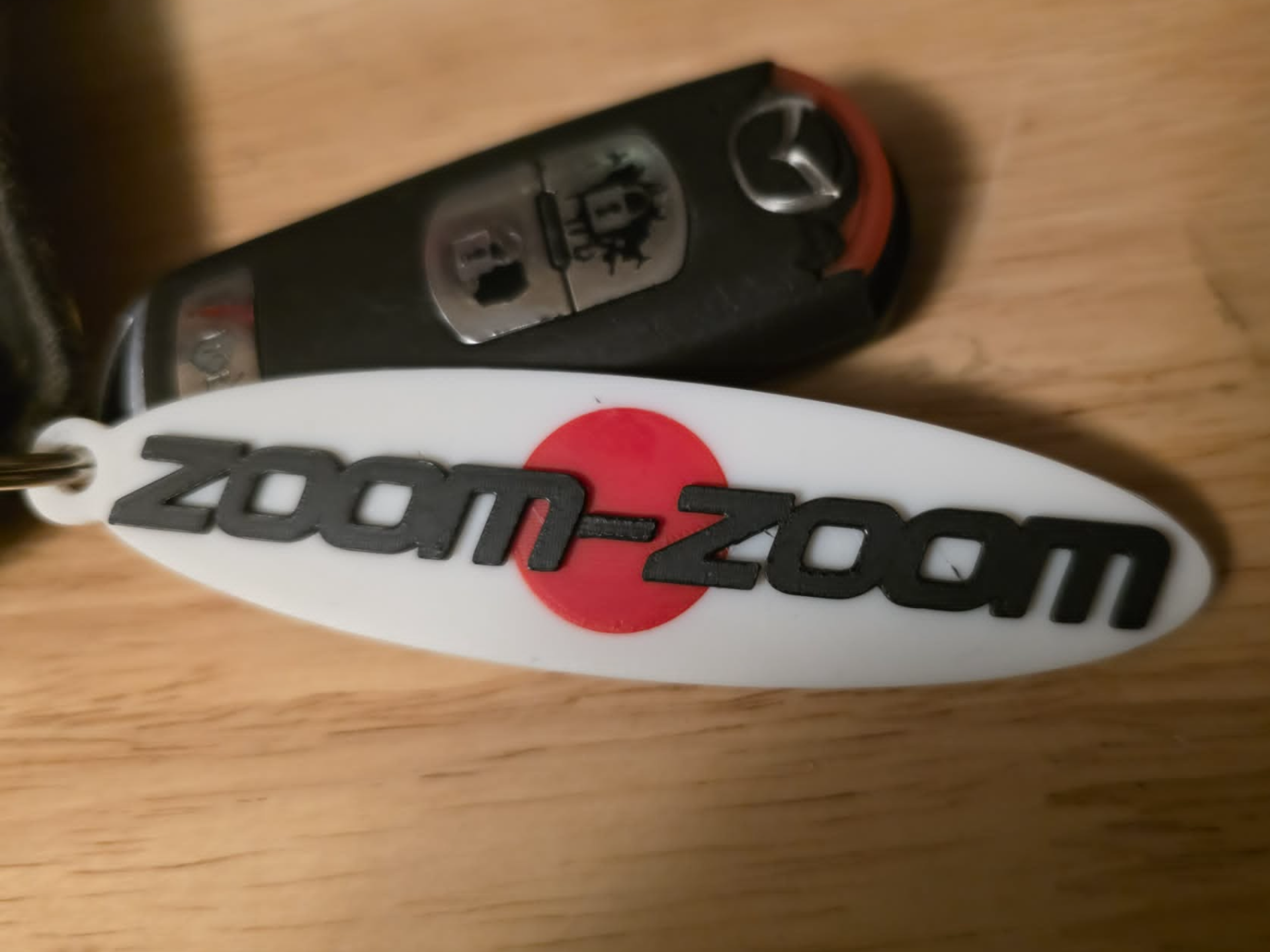 Zoom-Zoom Key chain
