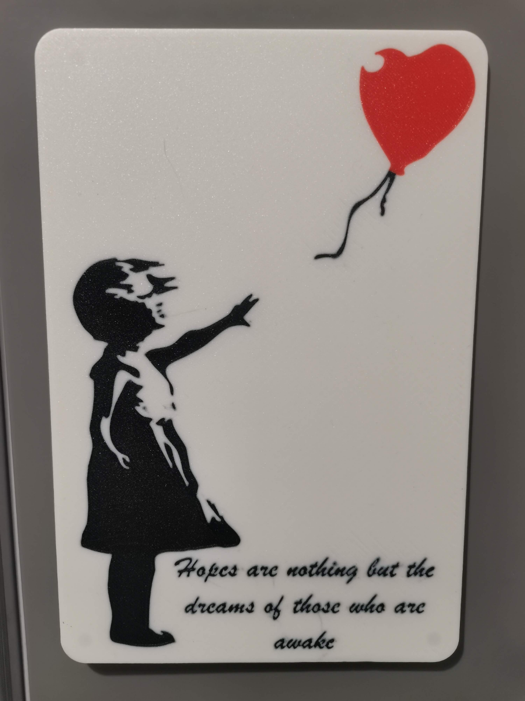 Banksy child with red balloon