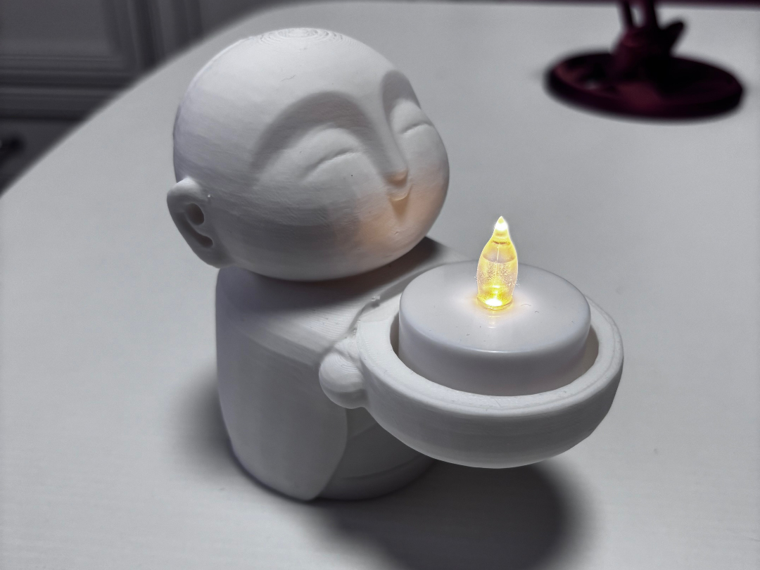 Buddhist led tealight holder