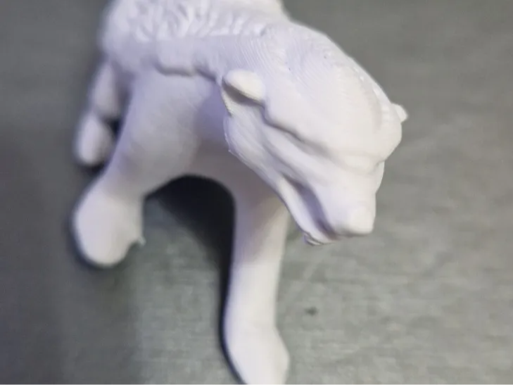 scultura animale tasso