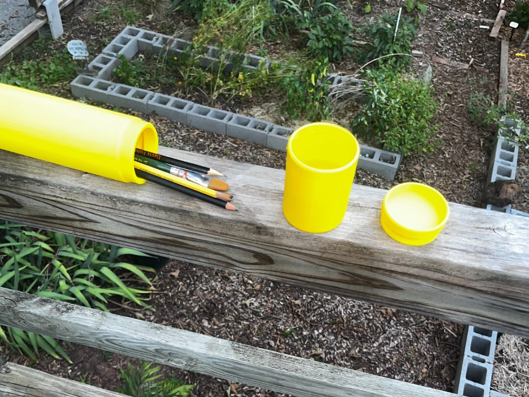 Paint brush, pencil and water cup transporter