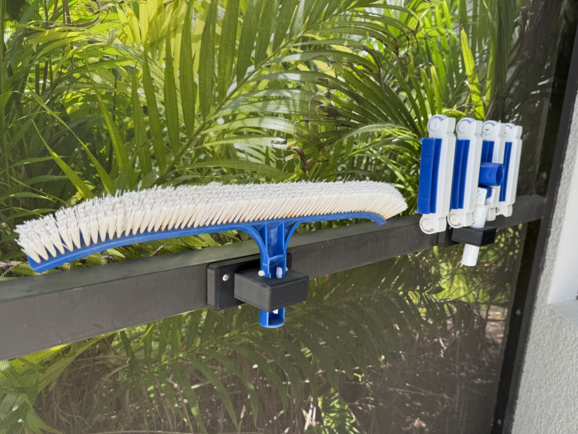 Pool tool holder for pool enclosure