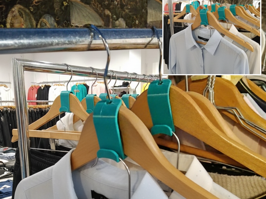 Gancio di collegamento per grucce