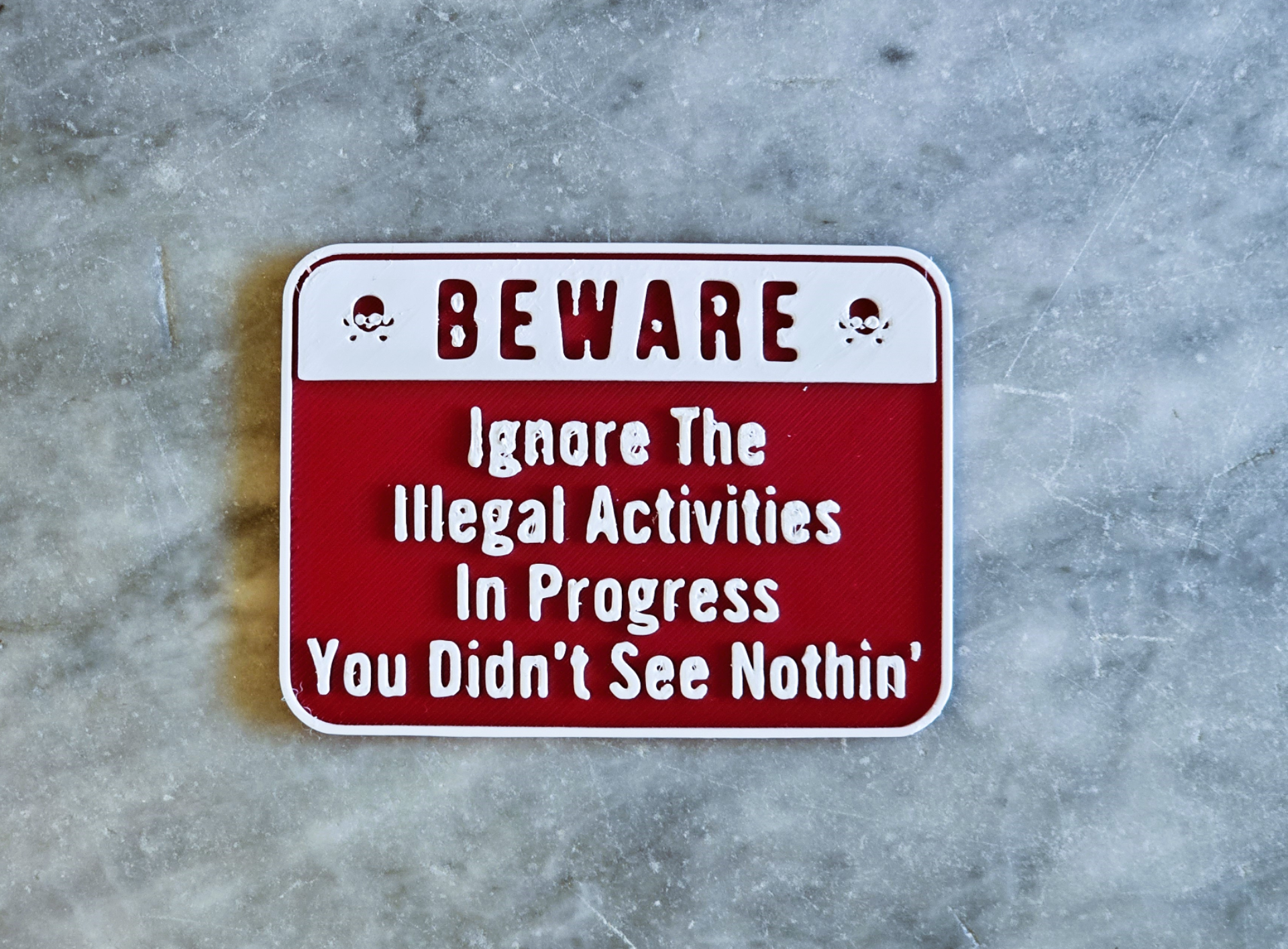 Ignore illegal activities sign