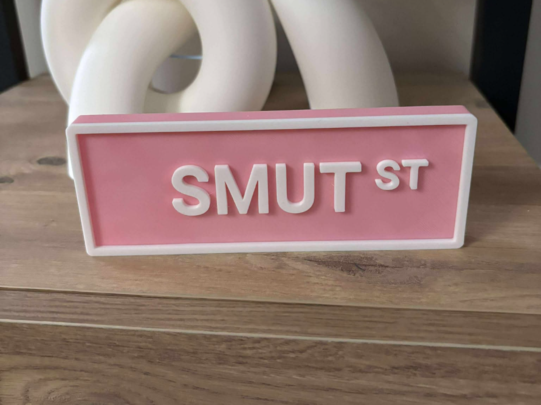 Smut St Book Shelf Street Sign