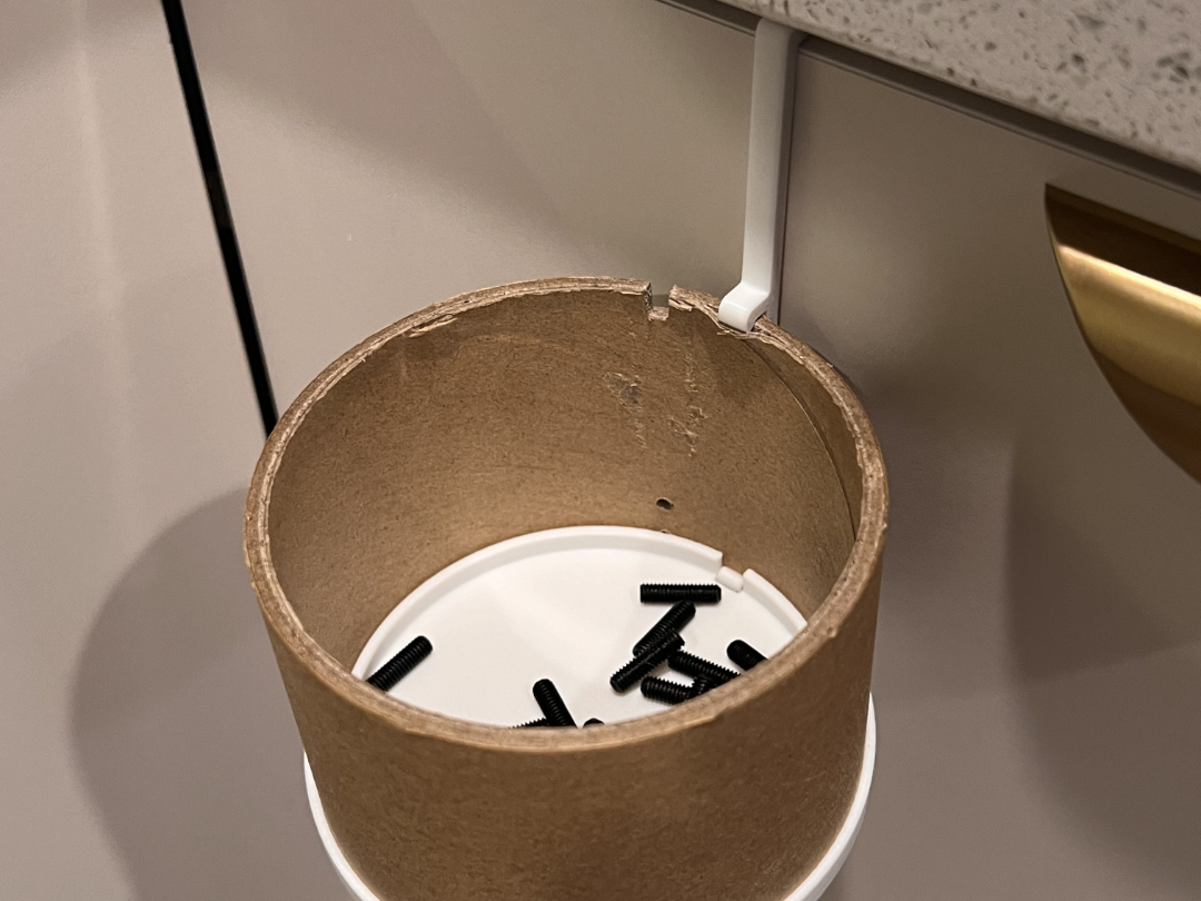Upcycling carboard spool hanger