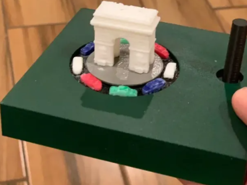 arch de triumph with revolving cars
