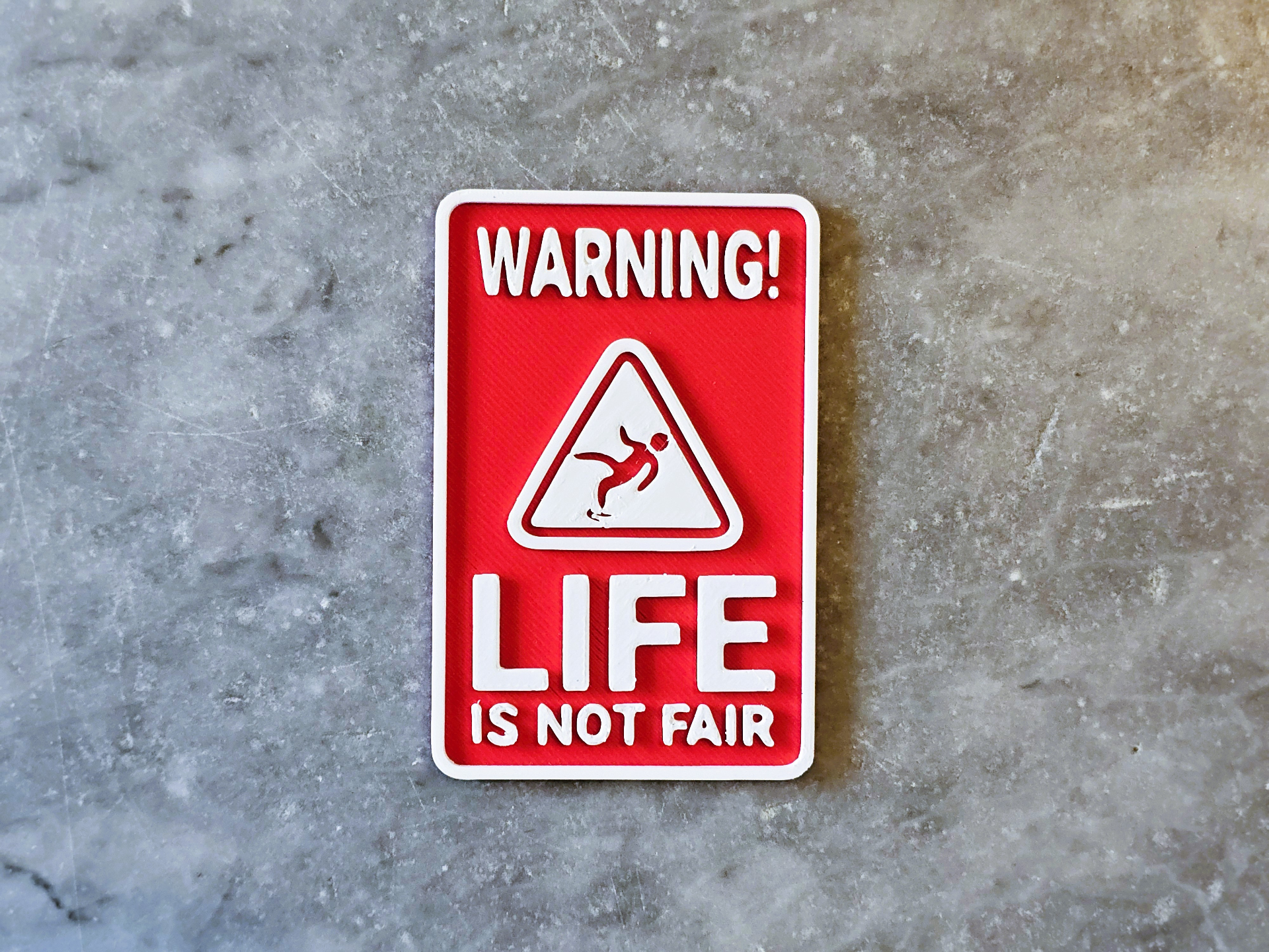 Life's not fair warning sign