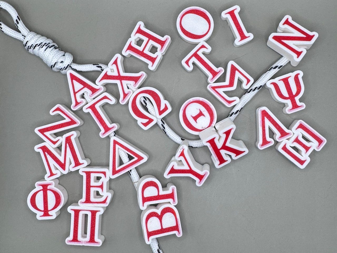 Set of 24 Greek letter chunky paracord beads