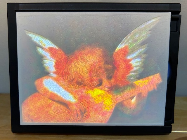 Cherub Playing a Lute (Lithophane); Angel, Wings