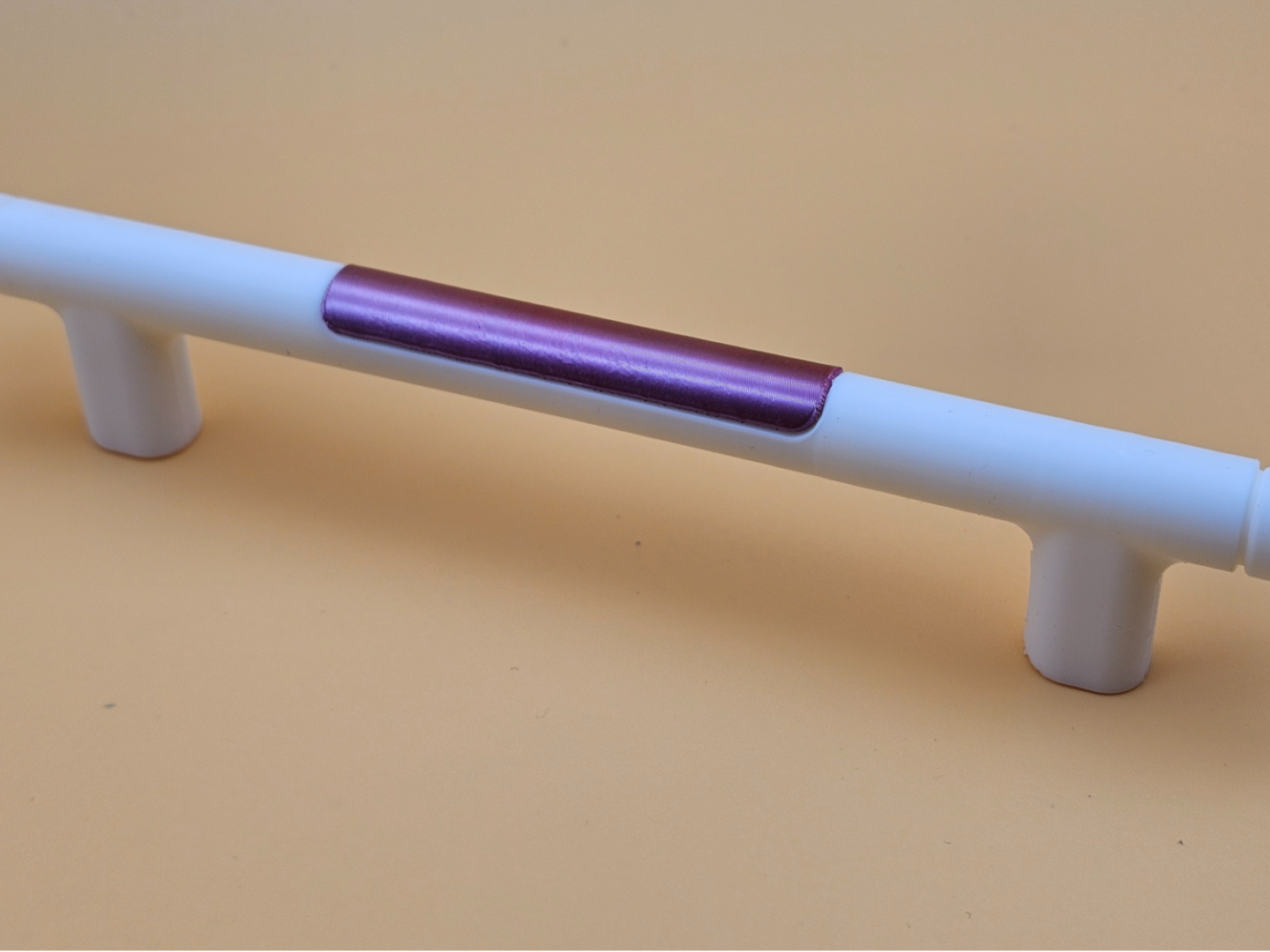 Two-Piece Cabinet Handle with Replaceable Insert