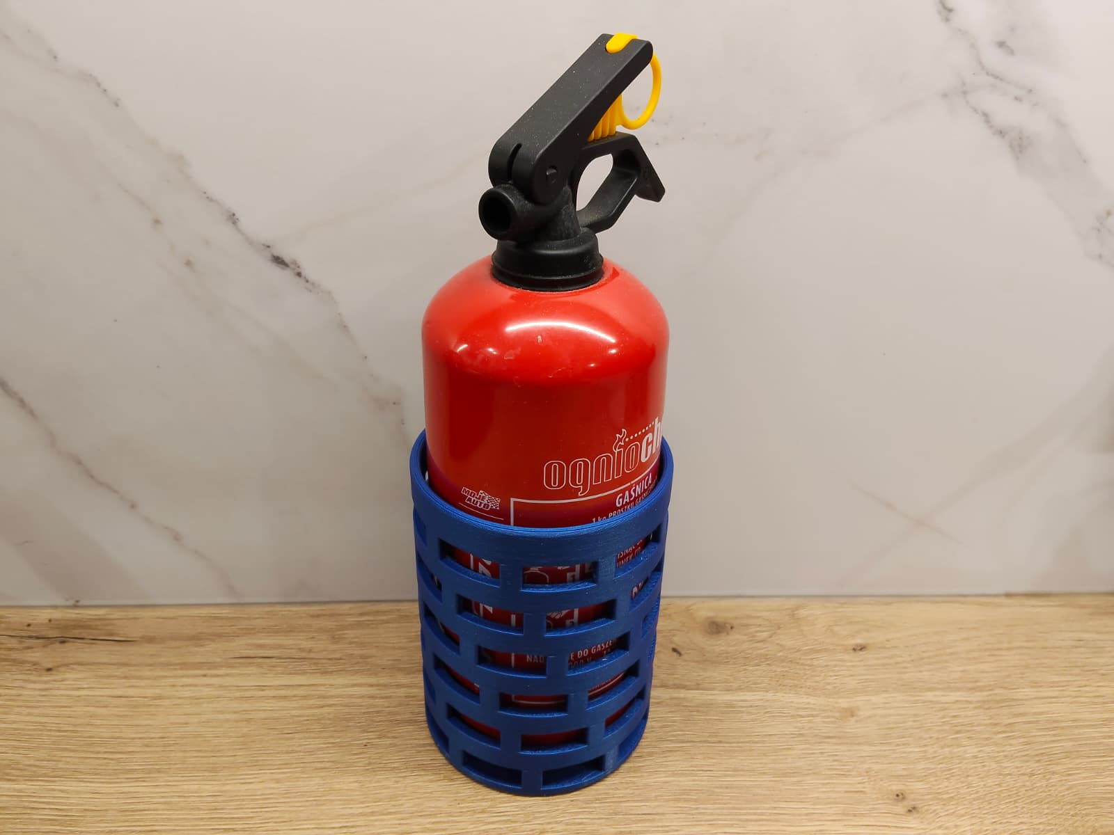 Fire extinguisher hanger