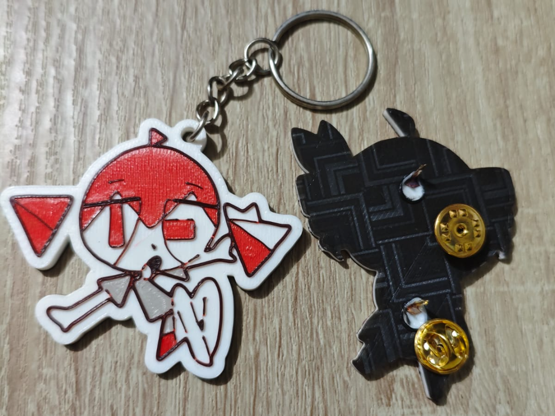 Doomer Teto keychain and pin
