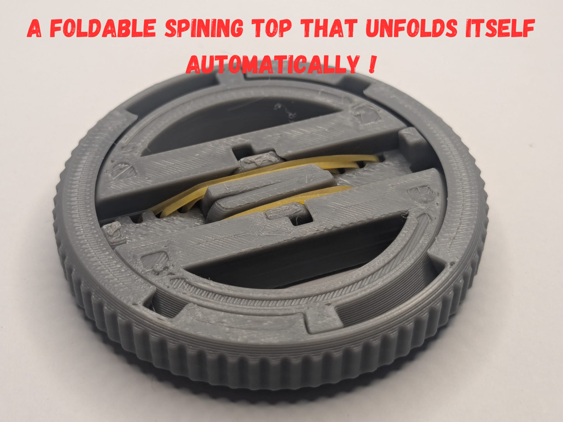 Self foldable spining top