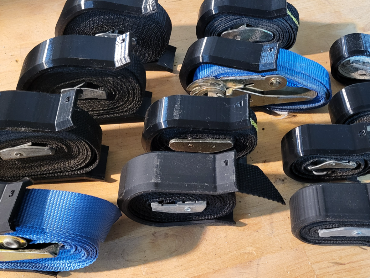 Cargo strap clip