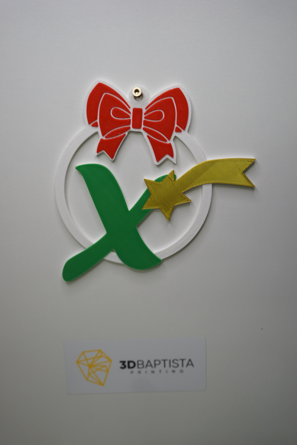 Christmas ball with the letter X