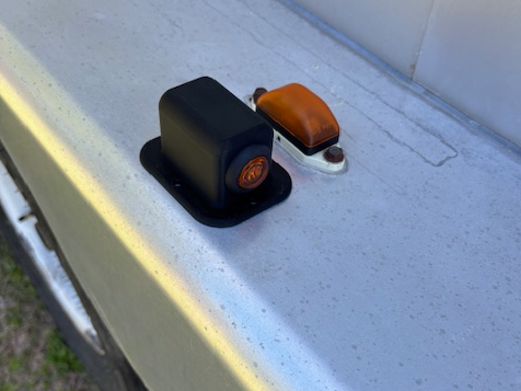 Trailer fender clearance light housing