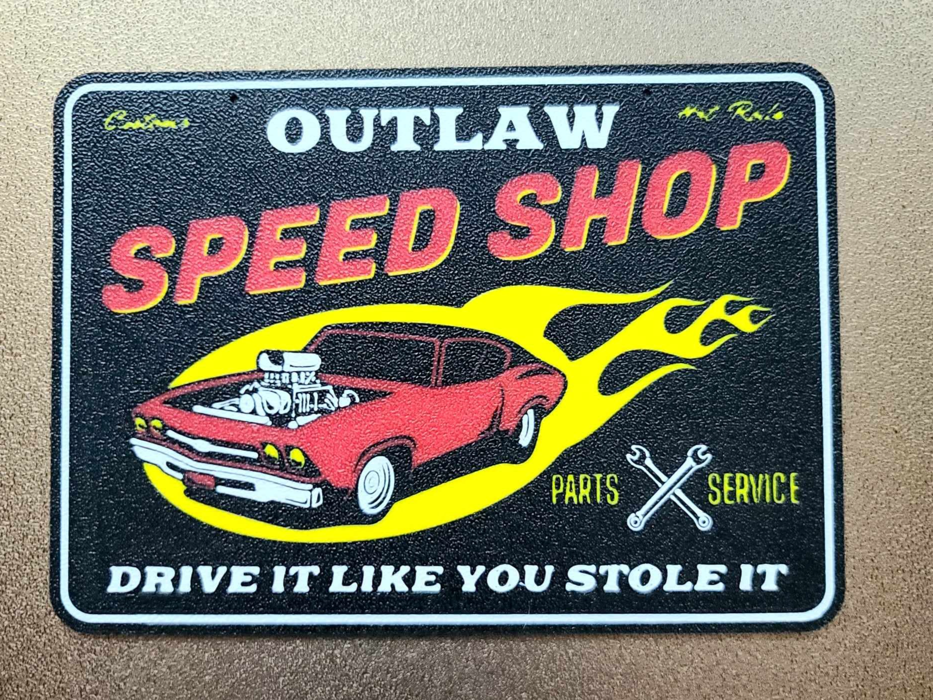 Outlaw Speed Shop Sign