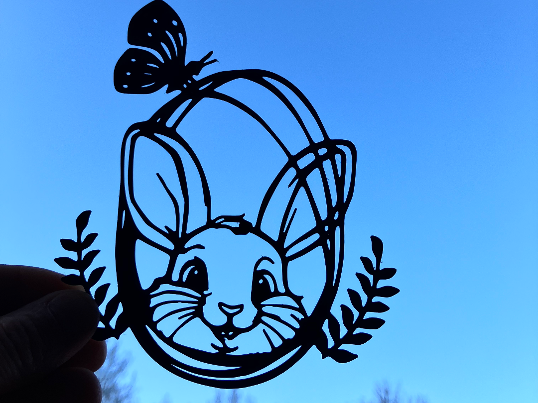 süßer osterhase mit schmetterling