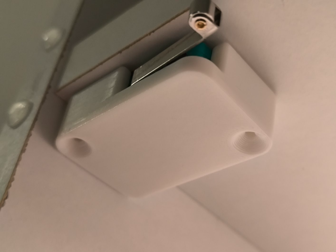 Door opening sensor microswitch holder