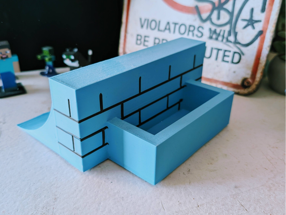 Fingerboard Brick Ledge with Quarter + Planter