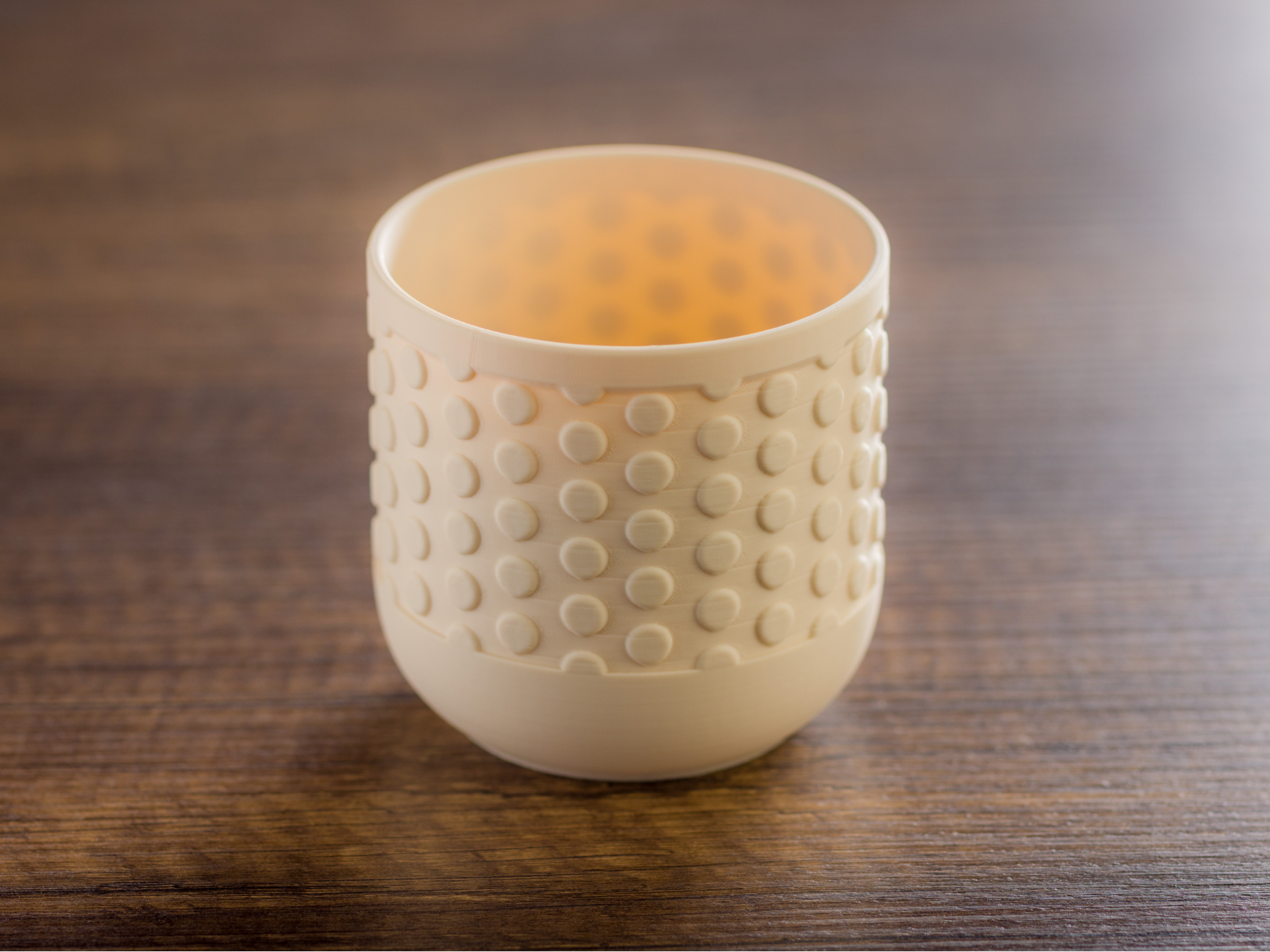 Planter with circle pattern.