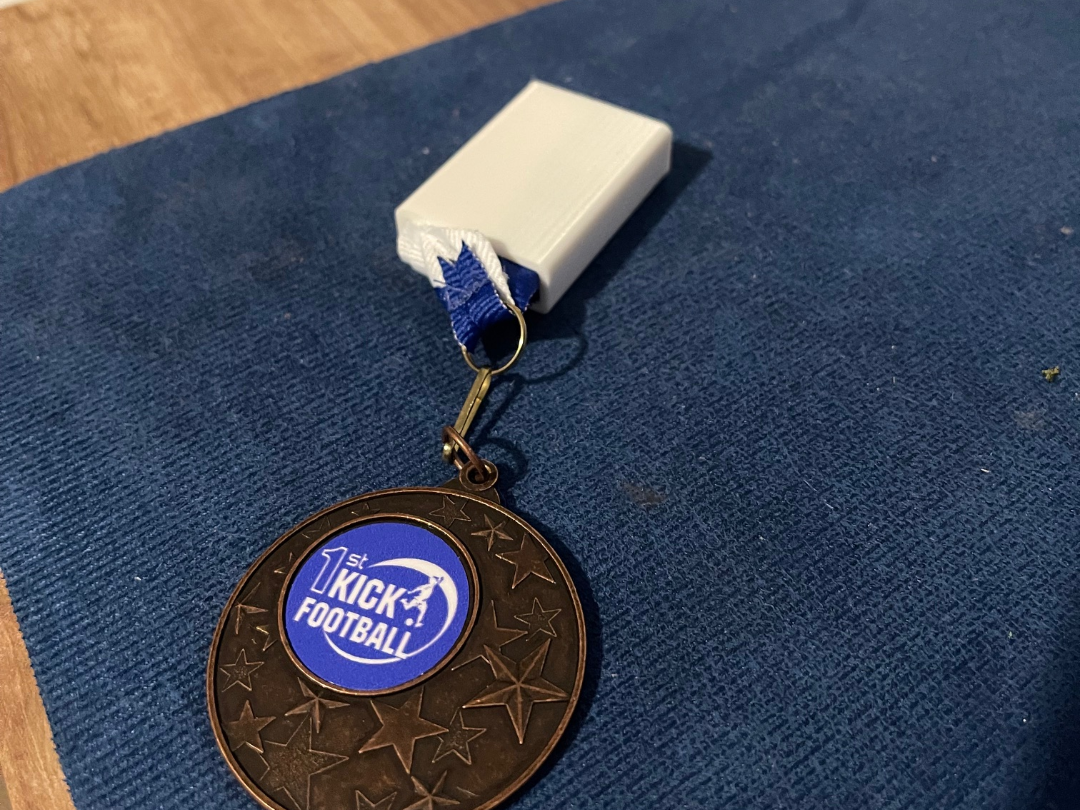 Medal ribbon sleeve tidy thingy