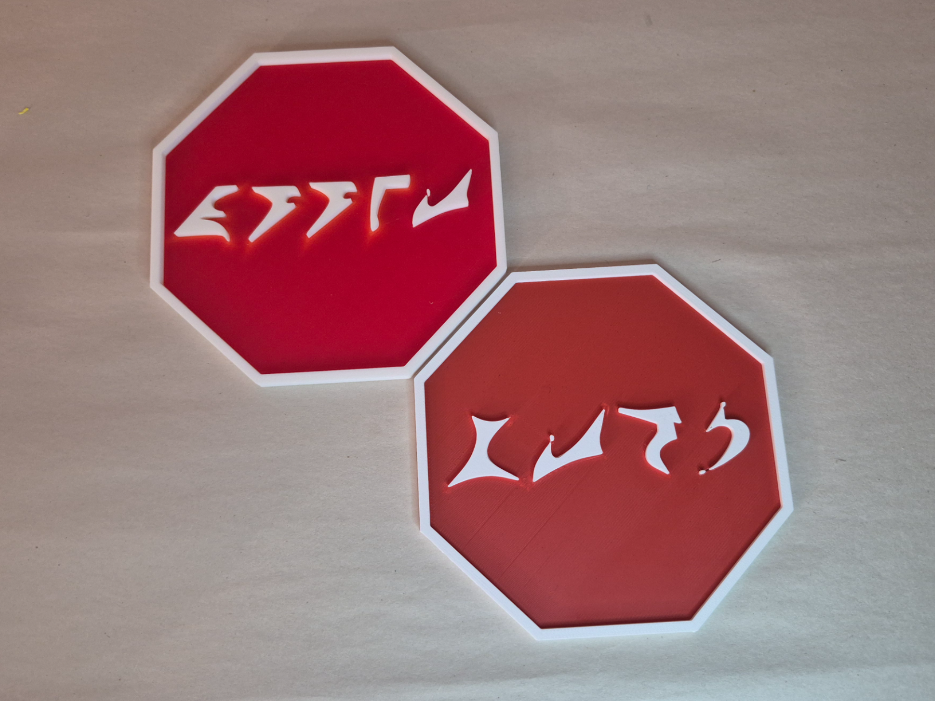 Klingon stop signs, french and english