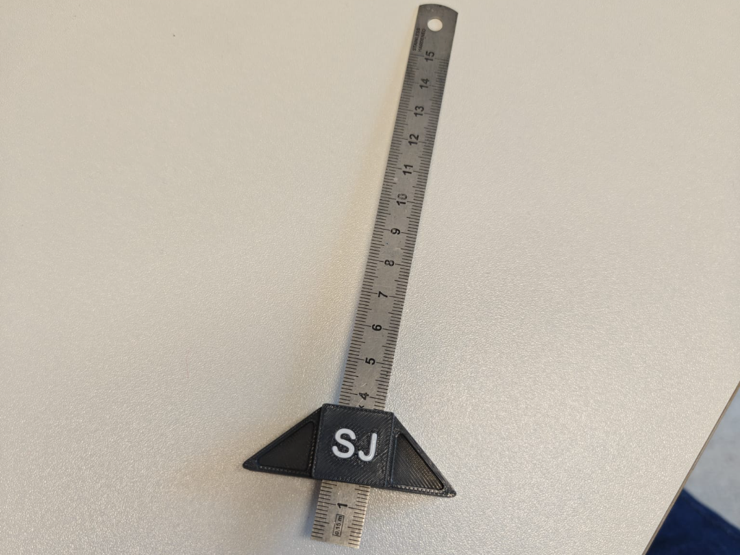 Attachment for metal ruler