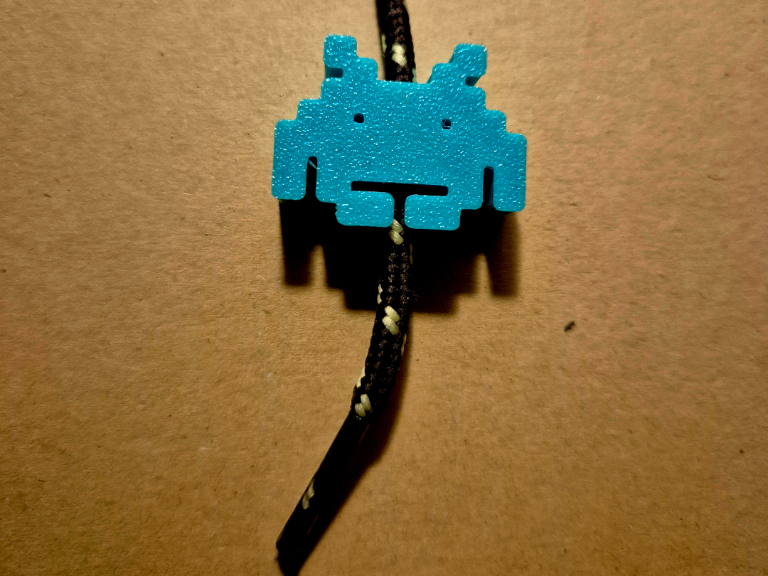 space invader drawstring beads
