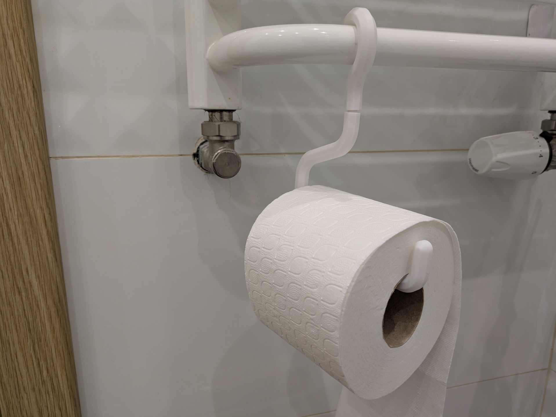 Toilet paper holder hanger