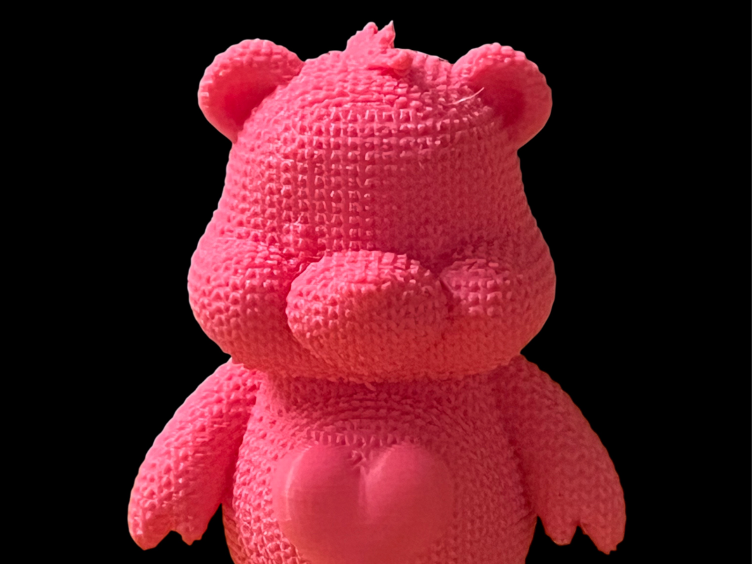 knitted care bear